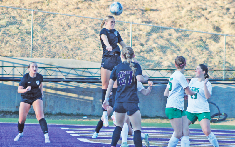 Kaitlyn Johnson goes up for a header during this week’s game against Franklin.