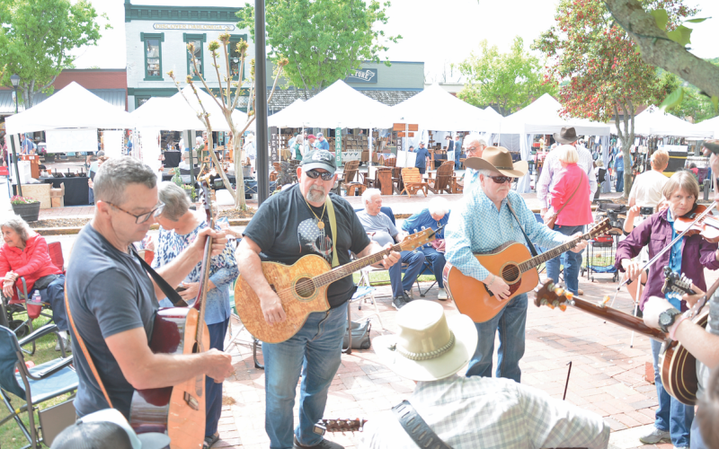 Musicians gather to join the jam sessions for some old-time and bluegrass music making throughout the weekend, beginning on Friday evening around the Square.
