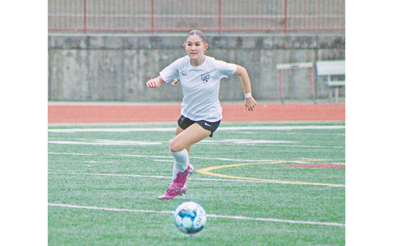 Lumpkin County’s Aubree Brown runs down a ball during a game this season.
