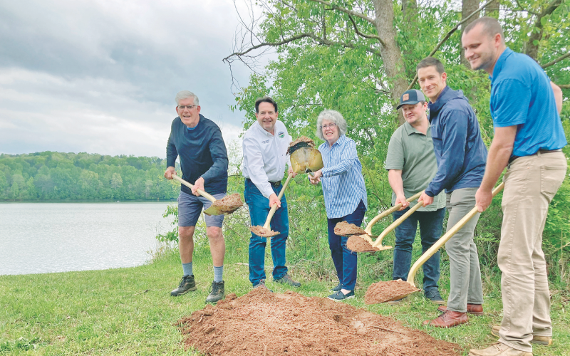Pictured, from left, City Councilman Ross Shirley, Councilman Lance Bagley, Mayor JoAnne Taylor, Councilman Ryan Reagin, Councilman Dan Brown and Lumpkin County Commissioner Rhett Stringer celebrate the groundbreaking of the new pedestrian bridge project.