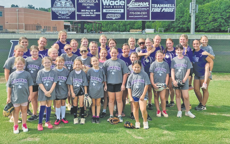 Youth soccer campers and varsity players gather at last week’s camp.