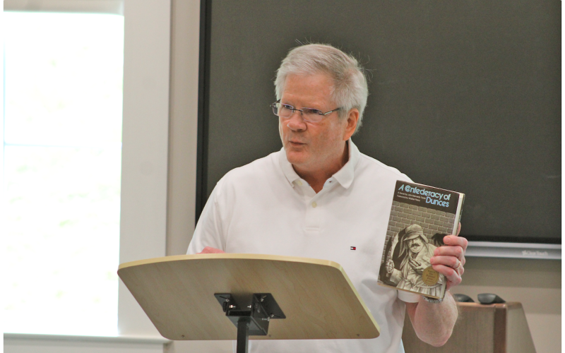 Southern humorist Jameson Gregg holds up a copy of his favorite novel, A Confederacy of Dunces, by John Kennedy Toole. The Pulitzer Prize-winning book was not appreciated in the author's time and was only released posthumously, in 1981.