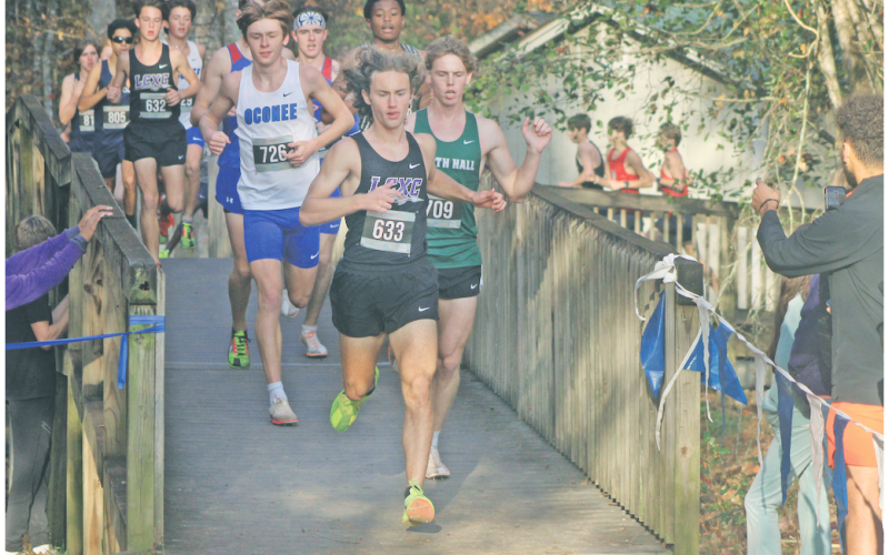 Lumpkin County’s standout runner Wyatt Windham leads the pack in a previous race. Windham will now compete for Georgia Tech.