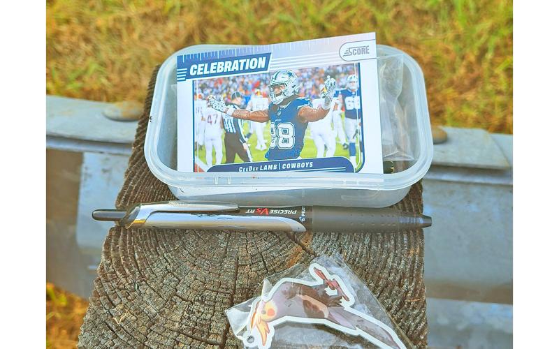 Leaving behind football cards in caches has become a personal calling-card for the author.