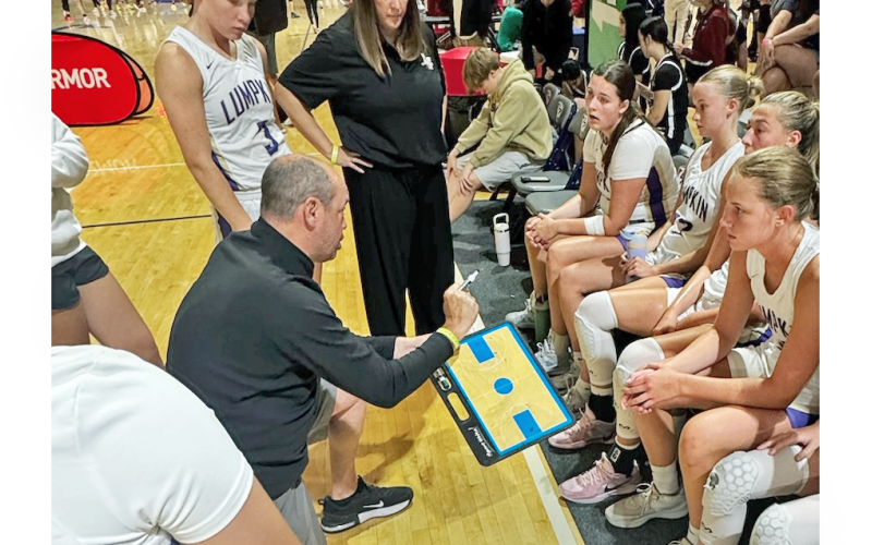 New Girls Basketball Head Coach Bryan Richerson talks strategy with the Lady Indians.