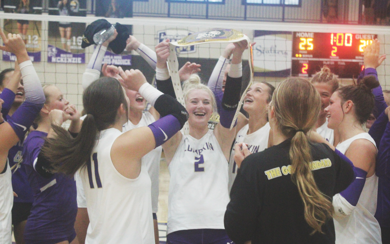 Averie Simmons celebrates alongside her teammates after she’s awarded the Player of The Week belt.