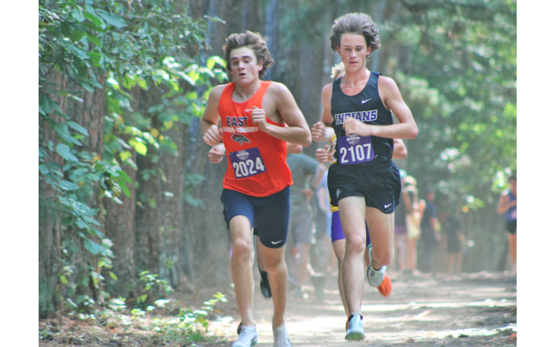 Lumpkin runner Witt Windham (right) won his third straight race this season at UNG’s Oakwood course.