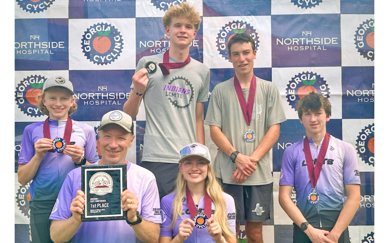 The Lumpkin mountain bike team shows off their newly-earned medals and awards. Pictured, Liam Alhadeff, David Weber, Asher Boegner, Shiloh Claussen, Mathieu Weber and Solomon Alhadeff.