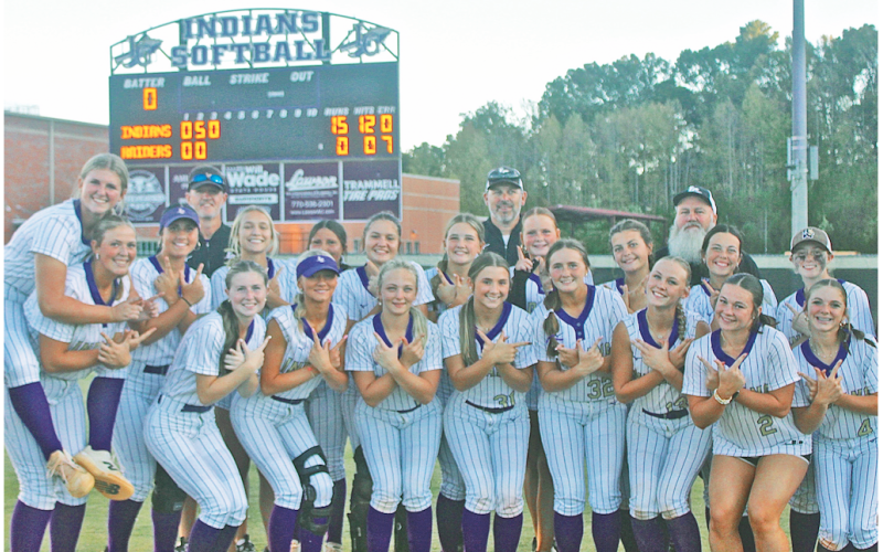 The Lady Indians celebrate their blowout win over Riverdale, which allowed the team to advance in the State Playoffs.