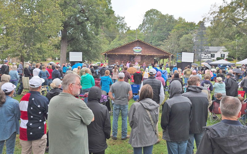 A downtown crowd braved the misty weather for a ceremony honoring the memory of Charlie Kirk on Sunday night.