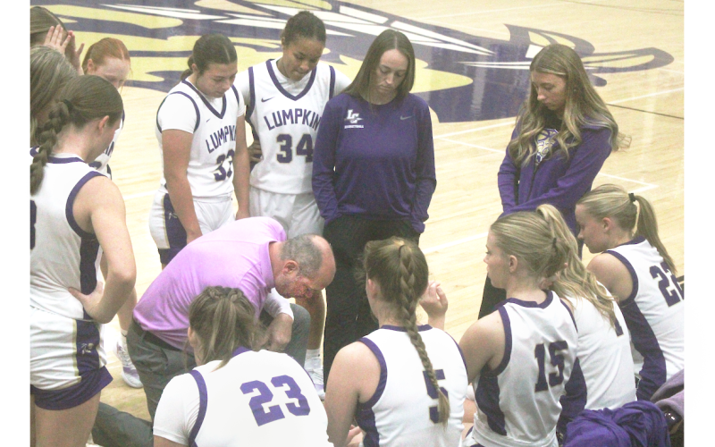 Head Coach Bryan Richerson draws up a game-plan for the Lady Indians during one of their recent games.