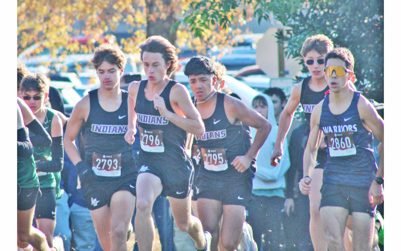Lumpkin runners, from left, Evan Good, Witt Windham and Paulo Ramirez sprint into last week’s Sectionals race.