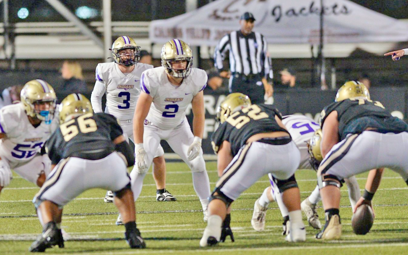 Brothers: No. 2 Mike Nichols (senior) and No. 3 Luke Nichols (freshman) back up the defensive line against Calhoun.