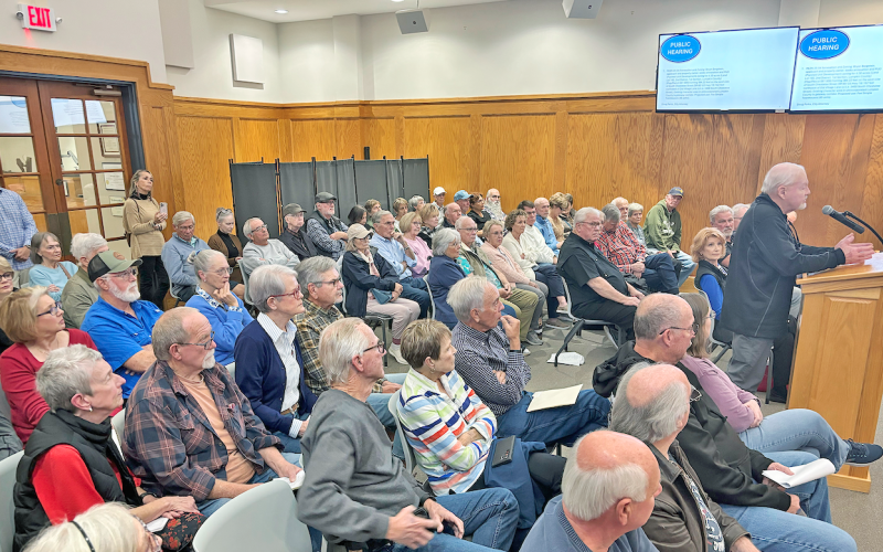 It was standing-room only in City Hall on Monday as local residents expressed their concerns about a proposed townhome development off Highway 60.