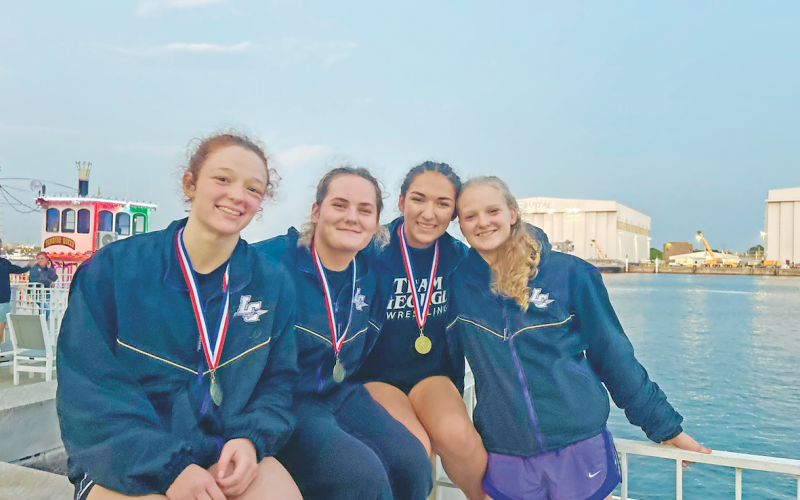 Nora Garbuzovas, Faith Jones, Mattie Mendoza and Greta Garbuzovas each came away as Gulf Coast Clash Champions in Moblie, Ala.