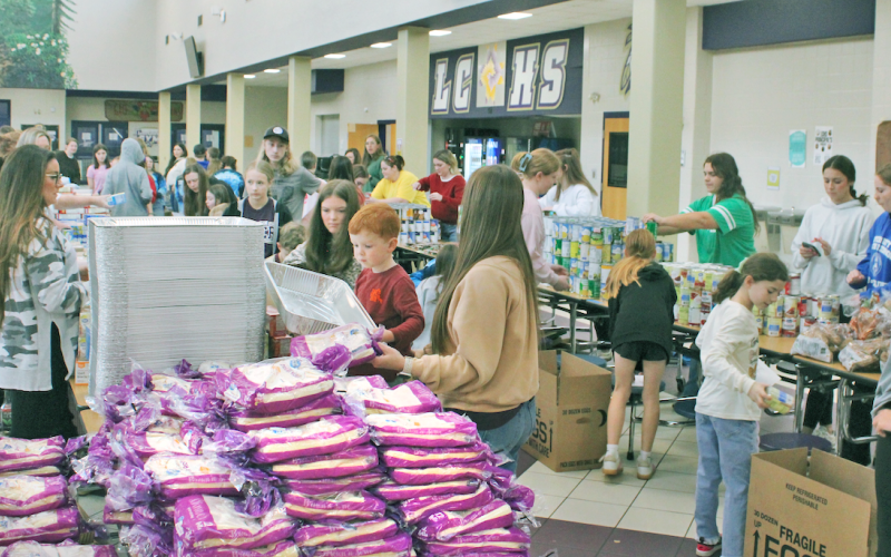 The 13th annual Thankful Hearts Take-N-Bake assembled a massive group of volunteers at the Lumpkin County High School cafeteria last Tuesday, which included representatives from the Lumpkin County Middle School Cheerleaders and Dahlonega Gymnastics.