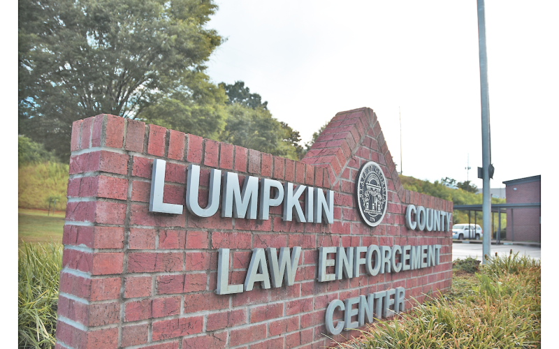 A pair of Lumpkin County Detention Center officers have been relieved of their duties after being charged with underage alcohol related offenses.