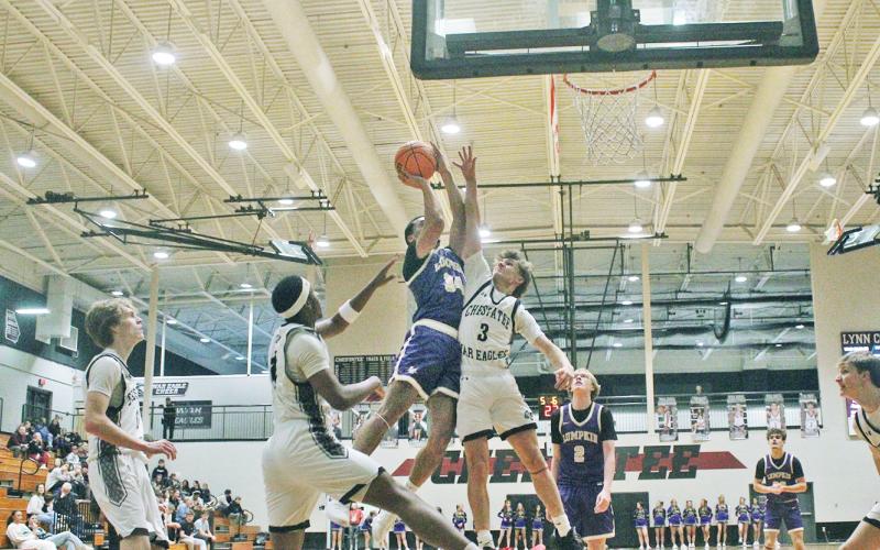Lumpkin County’s Keiwhan Gallagher takes to the air against Chestatee.