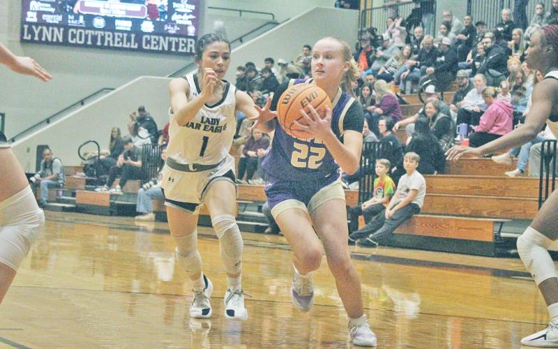 Lumpkin’s Anna Davis goes in for a layup against Chestatee.