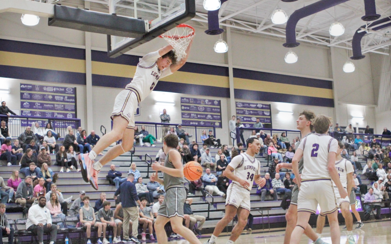 Lumpkin’s Martin Hulsey throws down a dunk over White County.