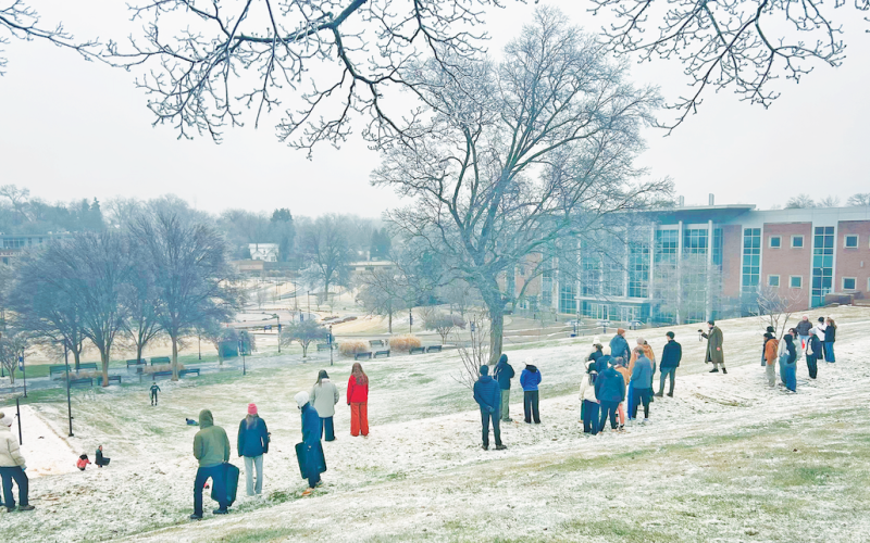 Students at the University of North Georgia made the most of the snow and ice mix over the weekend as they turned the hill in front of the library into a sledding zone. (Photo by Natalee Schiffhauer)