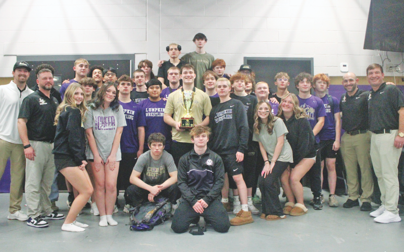 The Lumpkin wrestling team battled their way to a first place finish at the 6‑AAA Traditional Region Championships.