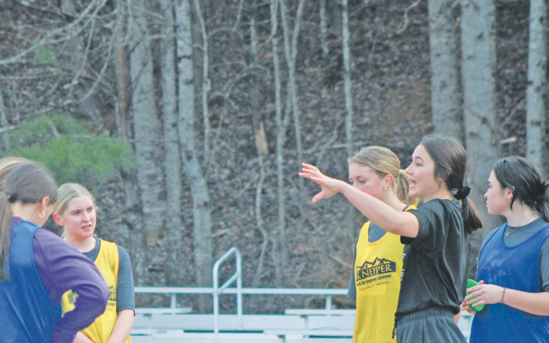 New Lumpkin County Girls Soccer Head Coach Abi Hunt talks things over with her team.