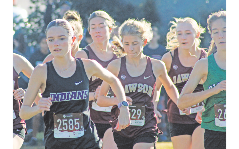 Lumpkin County’s Keli George (left) leads a pack of runners.