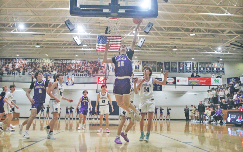 Lumpkin’s Tyler Cortez goes up for a basket en route to a big 78-55 win against region rival White County.