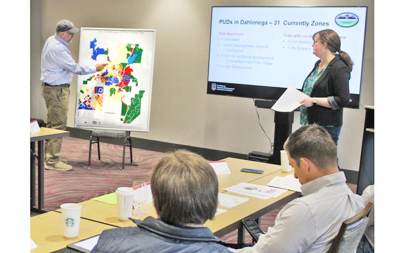 Mayor Sam Norton points to a large map highlighting Dahlonega’s Planned Unit Development zones during last month’s City Retreat.