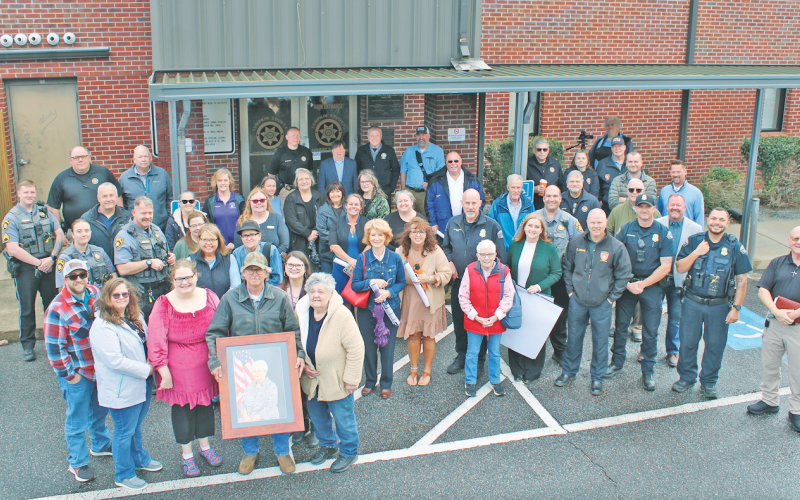 Family, friends and coworkers of the late Marie Satterfield gathered at the Sheriff’s Office on March 12 for a memorial plaque dedication.