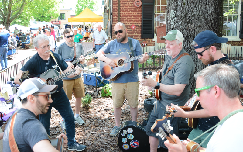 Bluegrass jam circles are a common sight around the Public Square during the annual Bear on the Square festival.