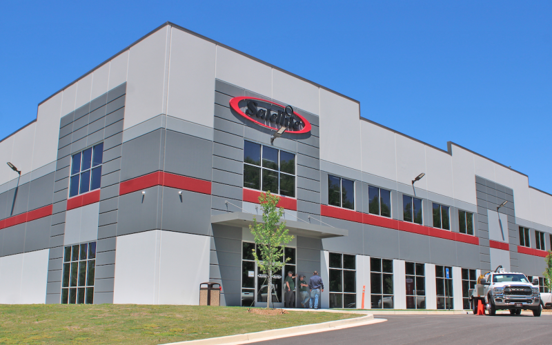 Satellite Industries held a ribbon cutting last week to celebrate its new 172,000 square foot manufacturing and distribution center, located on Fannie Russell Road in Lumpkin County.
