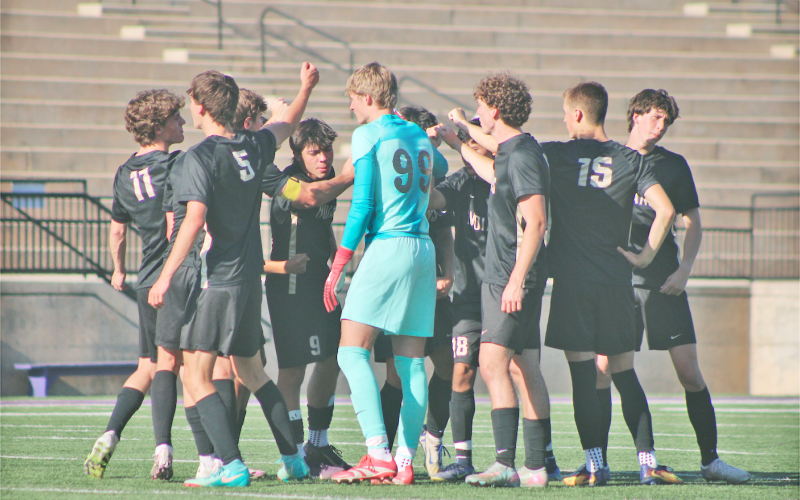 The Lumpkin County boys soccer team huddles up before a match this season.