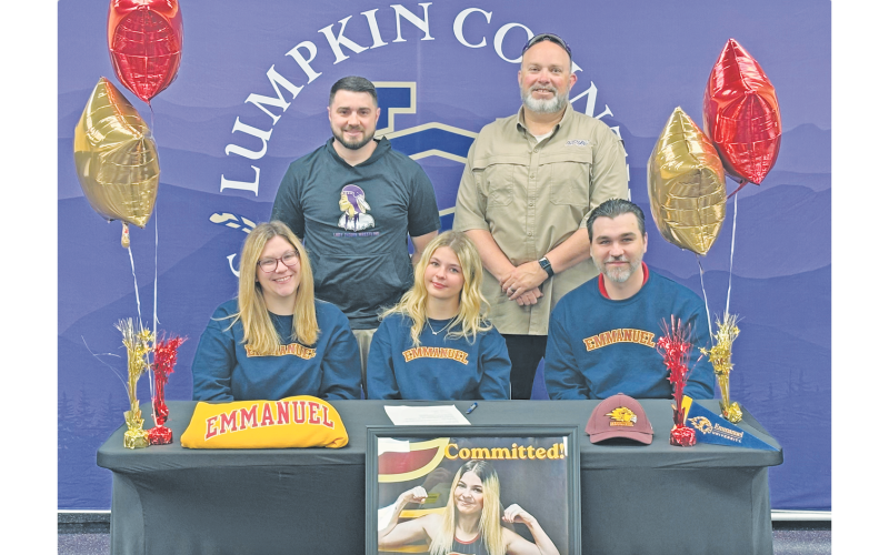 Gaby Luper signed her college commitment surrounded by her family and coaches.