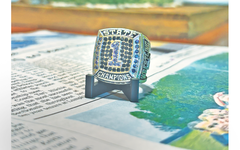 Nugget sports reporter Eligha Roper was presented with a State Championship ring by the Lady Indians wrestling team.