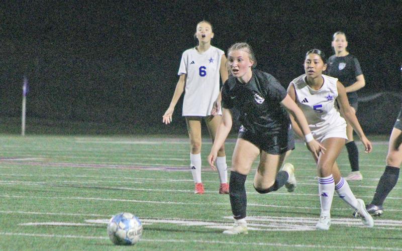 Dakota Atnip runs down a ball during a game this season.