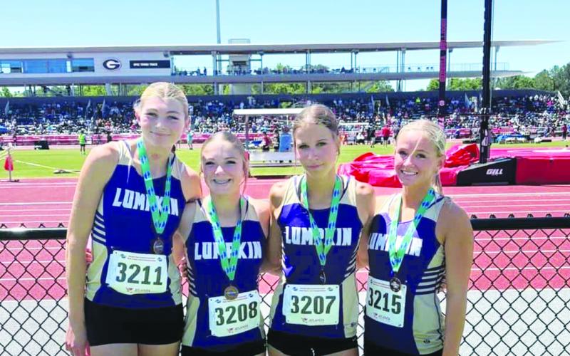 Lumpkin County runners Reagan Long, Maddox Henderson, Kellyn Coffer and Josie Webb broke their previously set school records in the 4x200 event at the State Championships.