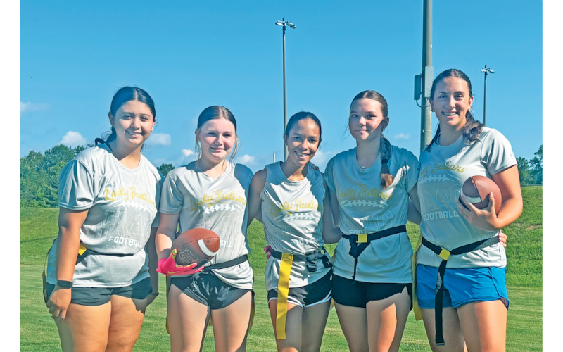 Lumpkin football athletes Gabriela Frausto, Haven Lingerfelt, Mary Meadows, Annalee Gilbert and Kylie Schubert gather for a quick photo during last week’s practice.