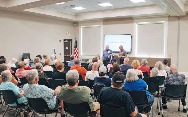 Sheriff Stacy Jarrard and District 9 State House candidate Roger Smith address the public during a special forum on Iron Mountain Park last Thursday.