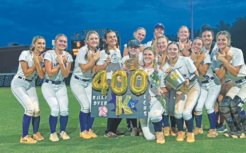 The Lumpkin County softball team celebrates their region win over Hart County.