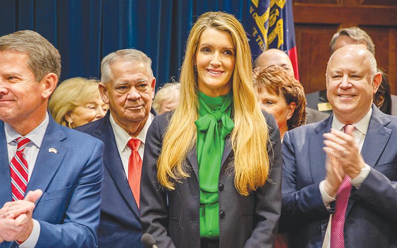 Soon-to-be U.S. Sen. Kelly Loeffler is introduced by Gov. Brian Kemp at a press conference Wednesday announcing her appointment to Congress for one year. Photo courtesy of Gov. Brian Kemp's office.