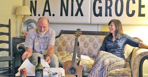 Songwriter Betsy Franck works with Billy Luesing on the lyrics of Luesing's original song during the first Song Saloon meeting. The group meets on the 2nd and 4th Tuesday of each month at The Crimson Moon from 7-9 p.m.
