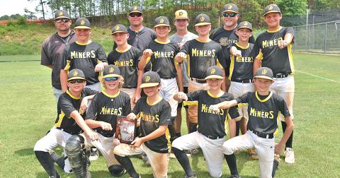 The Lumpkin Miners 12U baseball team shows off their runner-up rings from one of the tournaments they participated in during the 2019 spring season. The Miners went 26-14 during the three-month season.