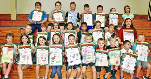 Park & Rec’s Day Camp participants took part in a poster contest for Community Helping Place Free Medical and Dental Clinics annual Tomato Sandwich Supper. Winners (first, second and third place) will be revealed Thursday, July 18, at Dahlonega Baptist Church during the event. Pictured are (first row, from left) Jacob Giles, Charlotte Gass, Madeline Gass, Jersey Ward, Colby Henderson, Micah Ellis, Christian Cotour, Landen Popham, Harlen Wager and Joey Moses; (second row, from left) Ethan Starley, Talon Ston