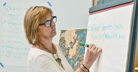 Chrissy Marlowe with the Carl Vinson Institute of Government makes notes of what Lumpkin Countians want to see on the 400/60 corridor during last week’s Stakeholders Meeting.