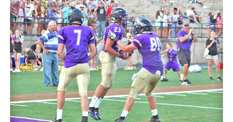 Lumpkin wide receiver Brian Cunane celebrates a touchdown reception during the Indians’ 41-7 scrimmage win over Towns County at the Burial Grounds at Cottrell Field on Friday night.