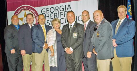 Attendees included, from left, Captain Marcus Sewell, Lieutenant Alan Roach, Captain Brendan Garland, Administrative Assistant to the Sheriff Rhonda Shepard, Sheriff Stacy Jarrard, Detention Division Staff Sergeant Noel Poisson, Chief Deputy Doug Cochran and Communications Director Carlton Chester. Senator Steve Gooch, Representative Kevin Tanner and Lumpkin County Coroner Jim Sheppard were on hand as well as Judge Michael Chastain led the swearing in ceremony.