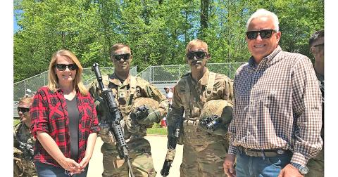 Jann Carl and Rodney Miller spend time with Army Rangers at Camp Frank D Merrill during filming earlier this year.