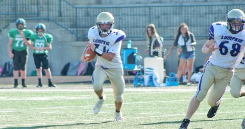 LCMS running back Will Wood looks for space after receiving a handoff. Wood scored two of the Indians’ three touchdowns in a 20-0 win over Fannin County last week.